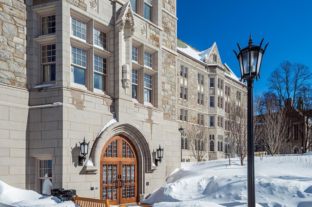 Exterior of the Woods College in winter